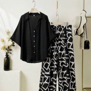 elegant black top with graphic palazzo set