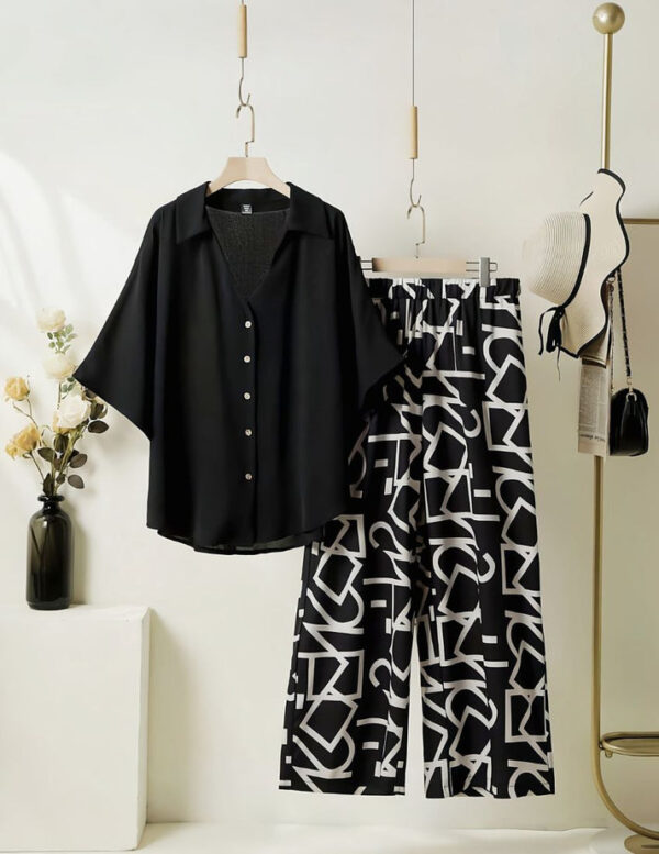 elegant black top with graphic palazzo set